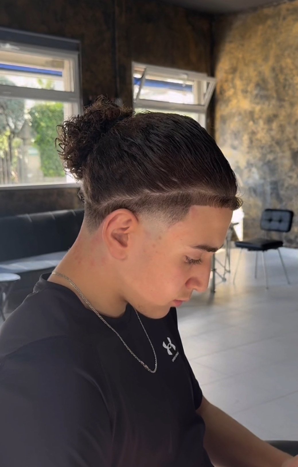 Corte de pelo degradado realizado en Omerta Barber, barbería de Guadarrama