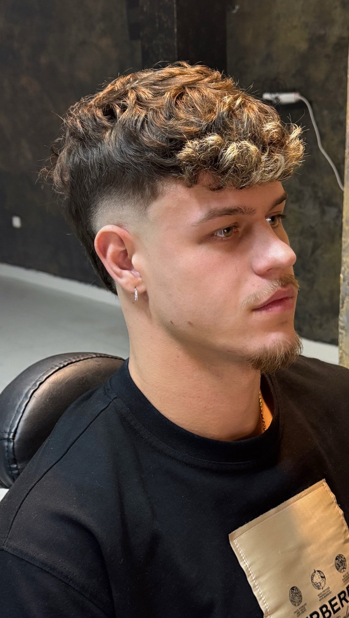 Resultado de corte de estilo moderno en la barbería Omerta Barber